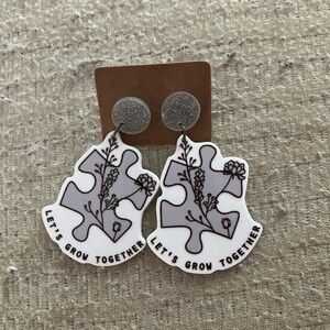 Puzzle Piece Earrings with Floral Design